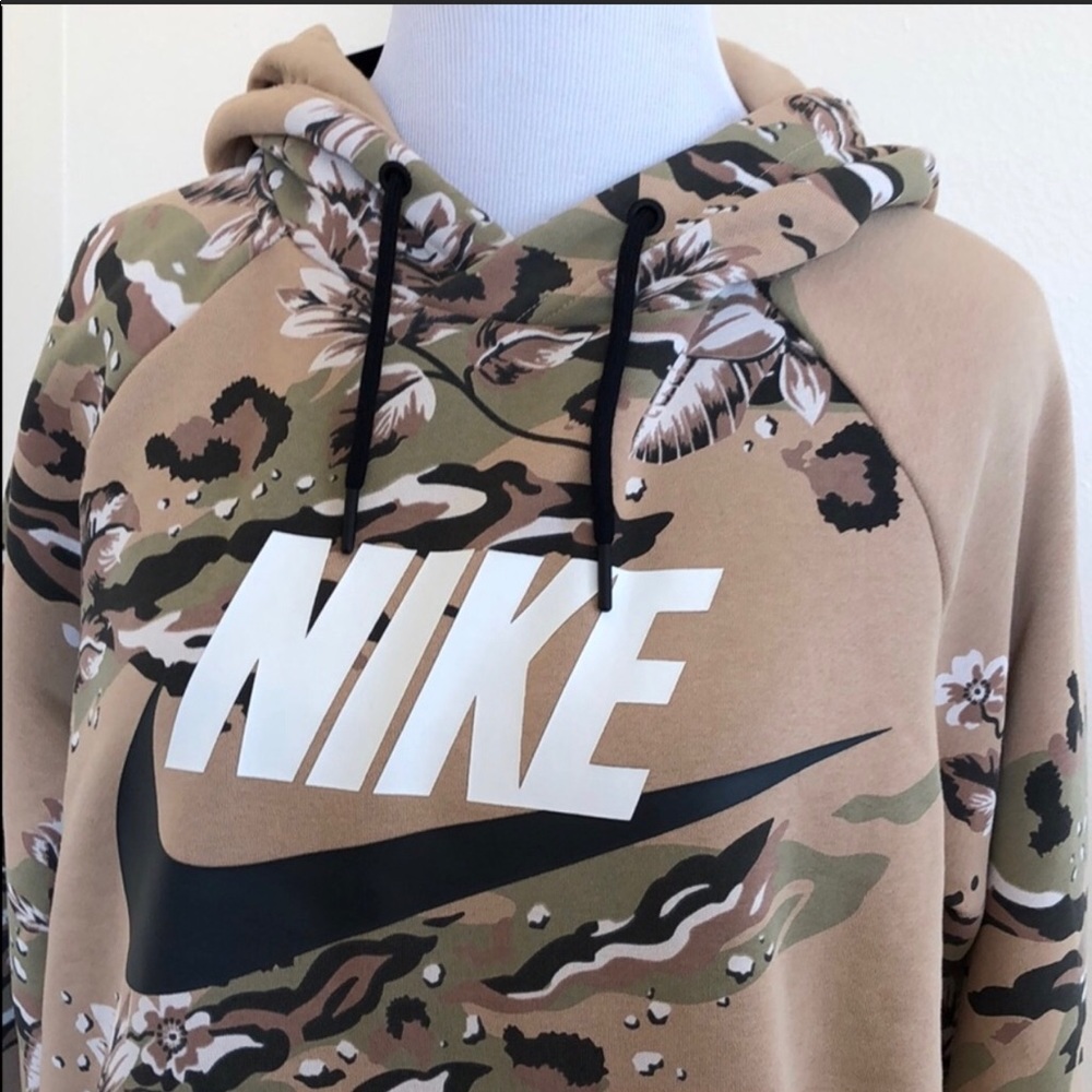 Ladies floral Nike pullover, dusty rose in color